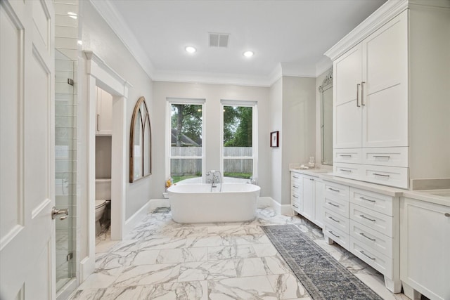 8703 Chelmsford Ln, Spring, TX 77379 - full bathroom with ornamental molding, marble finish flooring, a freestanding bath, vanity, and recessed lighting