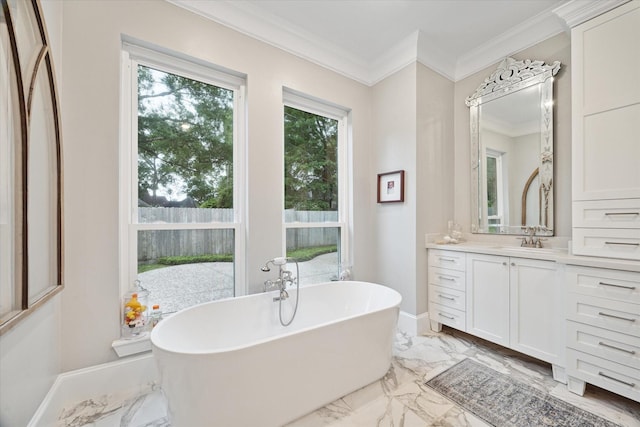 8703 Chelmsford Ln, Spring, TX 77379 - full bath with marble finish flooring, vanity, a soaking tub, and ornamental molding