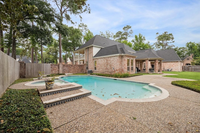 8703 Chelmsford Ln, Spring, TX 77379 - view of swimming pool with a patio area, a fenced backyard, an outdoor hot tub, and a diving board