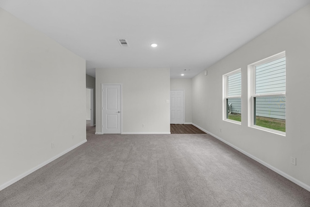 9309 Beryl Ln, Conroe, TX 77303 - carpeted spare room with baseboards and recessed lighting
