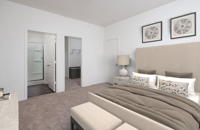9309 Beryl Ln, Conroe, TX 77303 - carpeted bedroom featuring a walk in closet and ensuite bath
