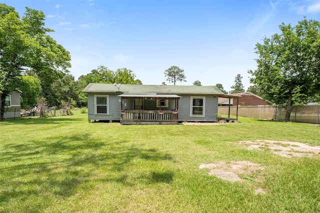 810 W N St, Livingston, TX 77351 - rear view of property with a deck
