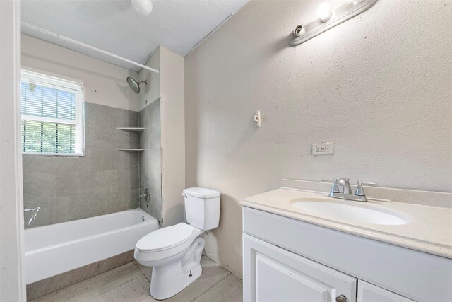 810 W N St, Livingston, TX 77351 - full bathroom featuring shower / bathtub combination, tile patterned flooring, and vanity