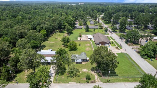 810 W N St, Livingston, TX 77351 - aerial view of a heavily wooded area