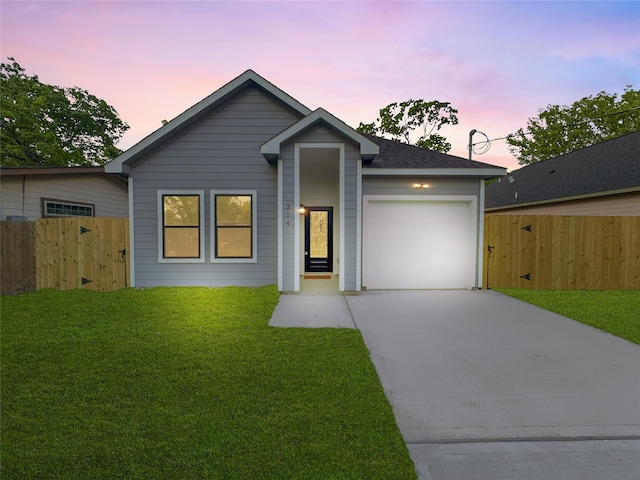 314 E Republic Ave, Baytown, TX 77520 - mid-century modern home with concrete driveway and a garage