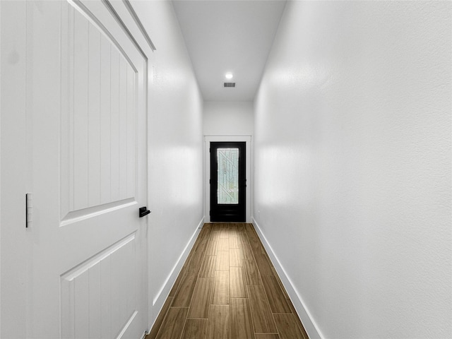 314 E Republic Ave, Baytown, TX 77520 - doorway to outside with dark wood-style flooring and recessed lighting
