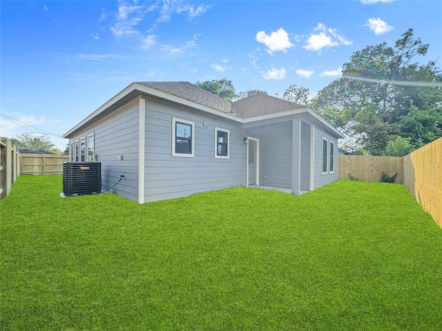 314 E Republic Ave, Baytown, TX 77520 - rear view of property with a fenced backyard and roof with shingles