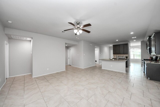 23714 Piedmont Forest Dr, Katy, TX 77493 - unfurnished living room featuring a ceiling fan, recessed lighting, and light tile patterned flooring