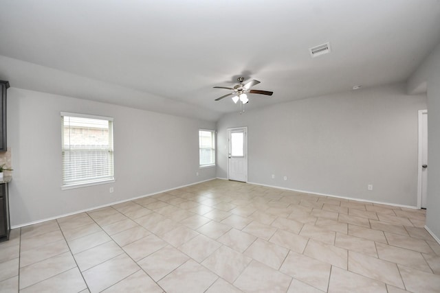 23714 Piedmont Forest Dr, Katy, TX 77493 - spare room with a ceiling fan and baseboards