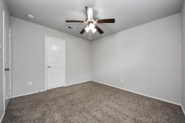 23714 Piedmont Forest Dr, Katy, TX 77493 - unfurnished bedroom featuring dark colored carpet and a ceiling fan