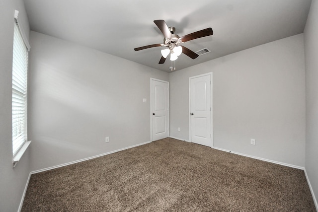 23714 Piedmont Forest Dr, Katy, TX 77493 - spare room with ceiling fan, carpet, and plenty of natural light