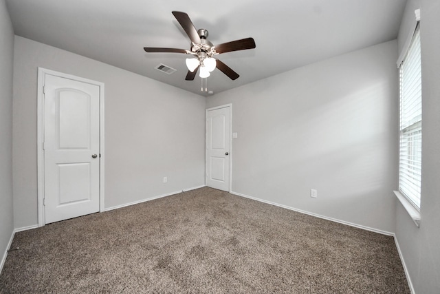 23714 Piedmont Forest Dr, Katy, TX 77493 - carpeted spare room featuring plenty of natural light and ceiling fan