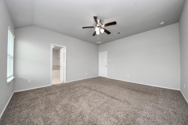 23714 Piedmont Forest Dr, Katy, TX 77493 - unfurnished bedroom featuring carpet, lofted ceiling, ensuite bath, and a ceiling fan