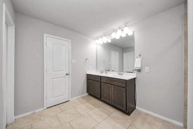 23714 Piedmont Forest Dr, Katy, TX 77493 - bathroom with double vanity and tile patterned floors