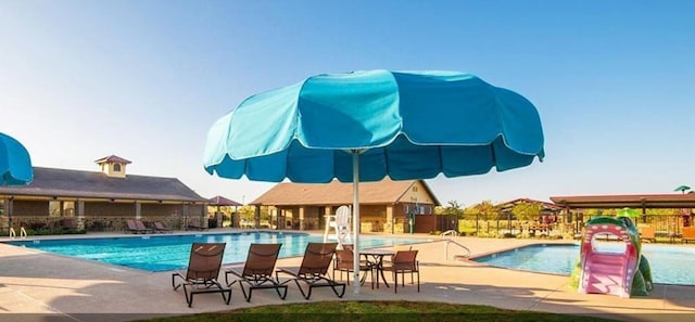 23714 Piedmont Forest Dr, Katy, TX 77493 - community pool featuring a patio