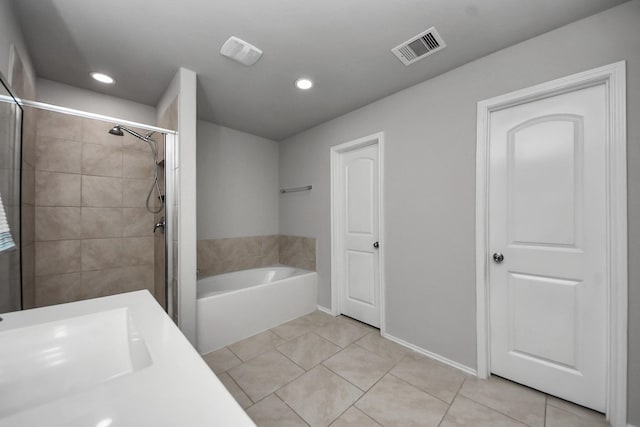 23714 Piedmont Forest Dr, Katy, TX 77493 - full bath featuring a garden tub, a stall shower, tile patterned flooring, and recessed lighting