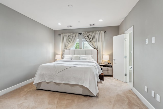 703 Bayou St, Houston, TX 77020 - bedroom with light carpet and recessed lighting
