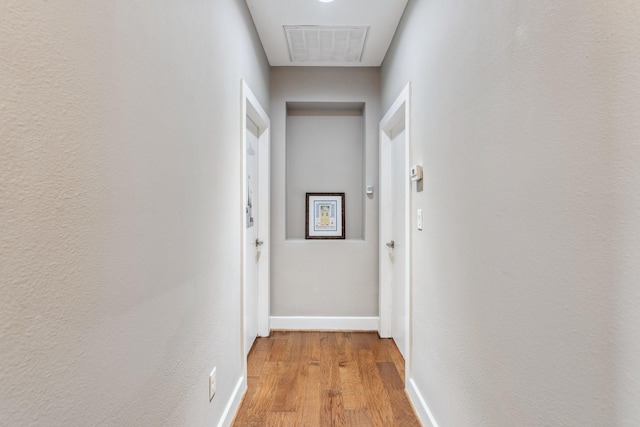 703 Bayou St, Houston, TX 77020 - hall with light wood-type flooring and baseboards