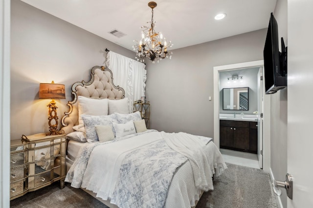 703 Bayou St, Houston, TX 77020 - bedroom featuring dark colored carpet, a chandelier, ensuite bathroom, and recessed lighting