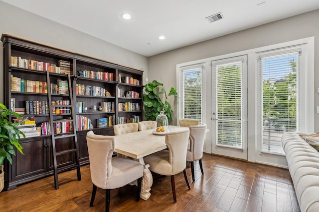 703 Bayou St, Houston, TX 77020 - dining room with plenty of natural light, wood-type flooring, and recessed lighting