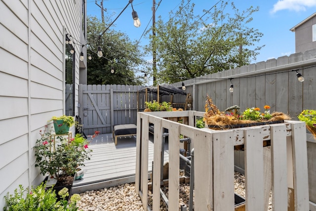 703 Bayou St, Houston, TX 77020 - wooden terrace with a fenced backyard