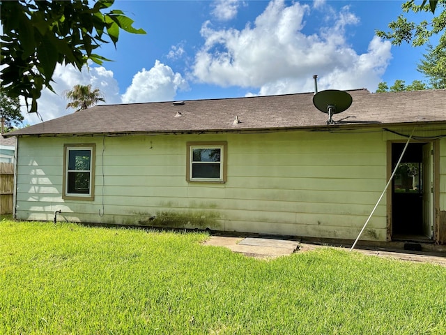 3511 Washington St, Pasadena, TX 77503 - view of side of property with a lawn