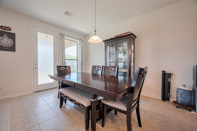 22403 Helen Springs Ln, Richmond, TX 77469 - dining room featuring baseboards and light tile patterned floors