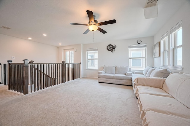 22403 Helen Springs Ln, Richmond, TX 77469 - carpeted living area featuring healthy amount of natural light, ceiling fan, and recessed lighting