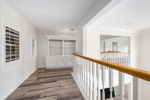 7921 Capri Cir, Houston, TX 77095 - hallway featuring dark wood finished floors, an upstairs landing, and recessed lighting