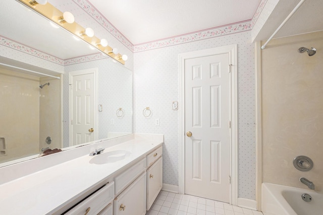 7921 Capri Cir, Houston, TX 77095 - bathroom with wallpapered walls, bathtub / shower combination, vanity, and tile patterned floors