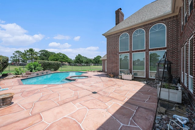 7921 Capri Cir, Houston, TX 77095 - view of swimming pool featuring a patio and a pool with connected hot tub