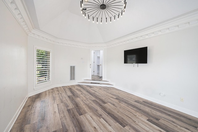 7921 Capri Cir, Houston, TX 77095 - unfurnished living room featuring wood finished floors and a chandelier