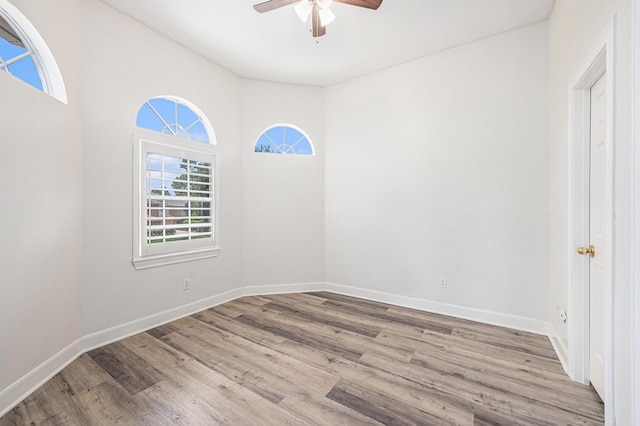 7921 Capri Cir, Houston, TX 77095 - unfurnished room featuring a ceiling fan and wood finished floors