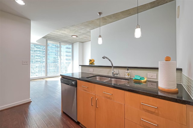 5925 Almeda Rd Unit 11608, Houston, TX 77004 - kitchen featuring dishwasher, floor to ceiling windows, dark stone countertops, backsplash, and dark wood finished floors