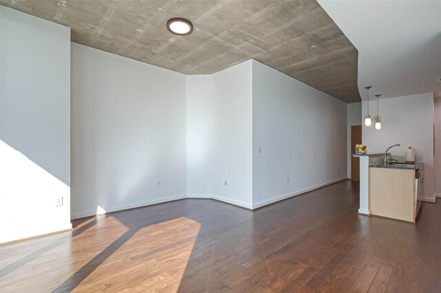 5925 Almeda Rd Unit 11608, Houston, TX 77004 - unfurnished living room featuring dark wood-style flooring