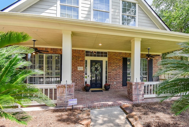 14023 Armant Place Dr, Cypress, TX 77429 - entrance to property featuring covered porch and brick siding