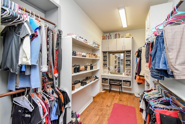 14023 Armant Place Dr, Cypress, TX 77429 - walk in closet with light wood-style flooring