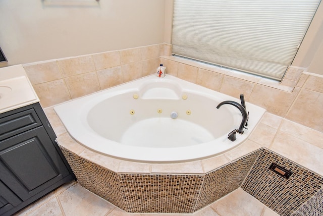 14023 Armant Place Dr, Cypress, TX 77429 - full bathroom featuring a jetted tub, vanity, and tile patterned flooring