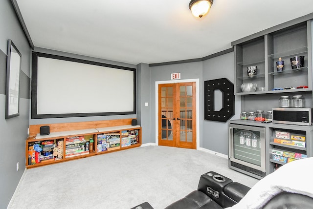 14023 Armant Place Dr, Cypress, TX 77429 - carpeted cinema room with beverage cooler, french doors, and a dry bar