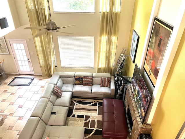13518 Oak Bend Forest Dr, Houston, TX 77083 - living room featuring a towering ceiling and ceiling fan