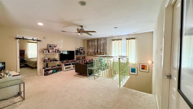 13518 Oak Bend Forest Dr, Houston, TX 77083 - living room featuring carpet floors, healthy amount of natural light, a ceiling fan, and recessed lighting