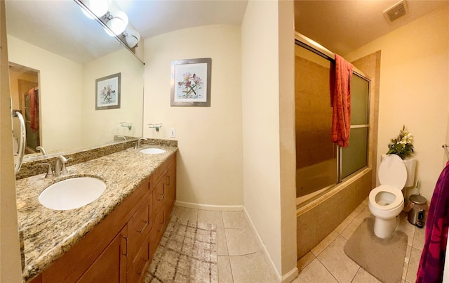 13518 Oak Bend Forest Dr, Houston, TX 77083 - full bathroom featuring tile patterned flooring, bath / shower combo with glass door, and double vanity