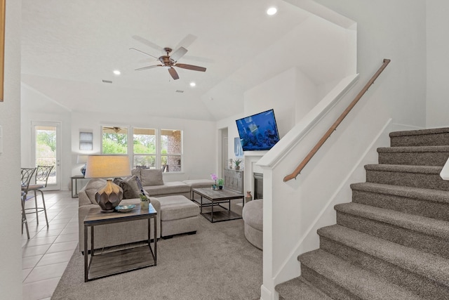 1503 Wheatley Hill Ln, Katy, TX 77494 - living room with ceiling fan, stairs, lofted ceiling, recessed lighting, and light tile patterned floors