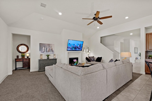 1503 Wheatley Hill Ln, Katy, TX 77494 - living room with ceiling fan, a fireplace, recessed lighting, lofted ceiling, and light tile patterned flooring