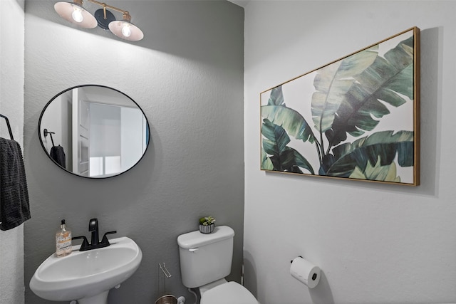 18427 Counce Meadow Ct, Cypress, TX 77433 - half bath featuring a sink and toilet