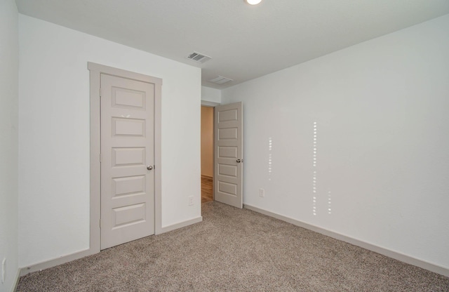 623 Hidden Brook Dr, Baytown, TX 77523 - empty room featuring carpet flooring and baseboards