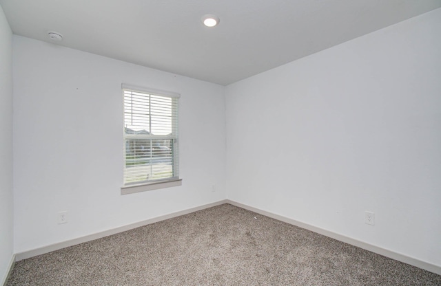 623 Hidden Brook Dr, Baytown, TX 77523 - empty room with carpet and a smoke detector