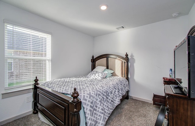 623 Hidden Brook Dr, Baytown, TX 77523 - carpeted bedroom featuring baseboards