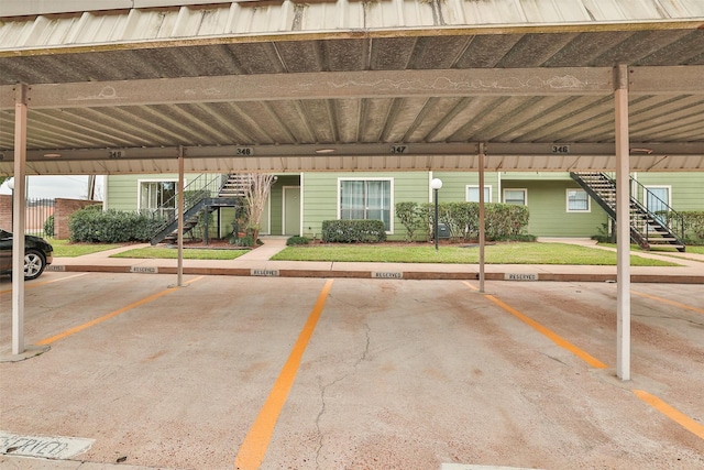 14777 Wunderlich Dr Unit 1103, Houston, TX 77069 - covered parking lot with stairway