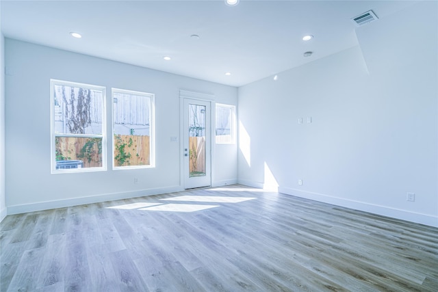 5402 Margarita St, Houston, TX 77020 - spare room with wood finished floors and recessed lighting